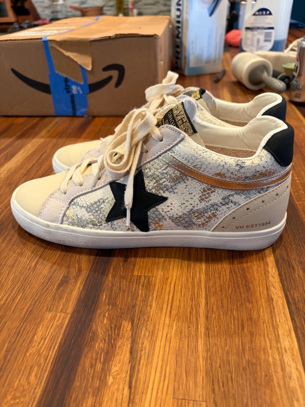 Vintage White Cream Sneakers with Black Star and Gold Accent